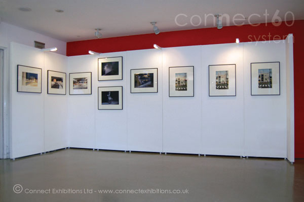 displays walling, display walling, display walling temporary - portable - movable showing a corner stand at the exhibition of <em>'The Association of Photographers'</em> in Sadlers Wells - London. (framed photographs)