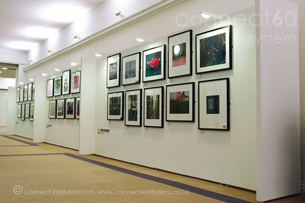 White Exhibition Boards forming a wall for a Photography Exhibition in London - UK.